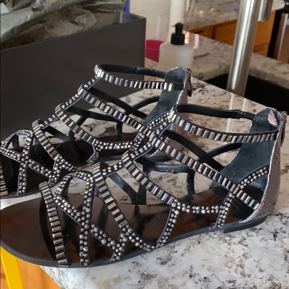 Black steel sandals